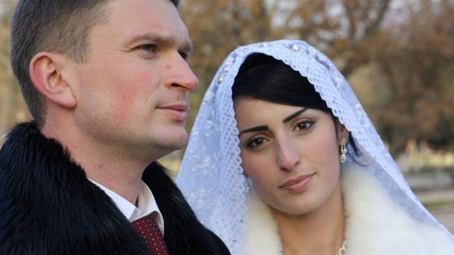 Колаборантка Жаміла Запускалова та її чоловік. ФОТО: investigator.org.ua