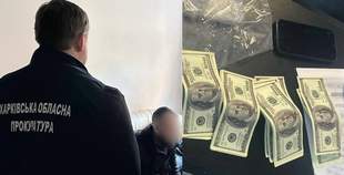 Kharkiv police officer detained in Odesa on suspicion of helping fugitives abroad