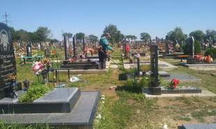 Utility company in Odesa region fined for overcharging for grave digging