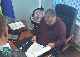 В Одесской области поселковый голова "торговал" землей за доллары