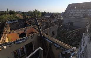A house caught fire in the Odesa region following a Russian strike; there are casualties