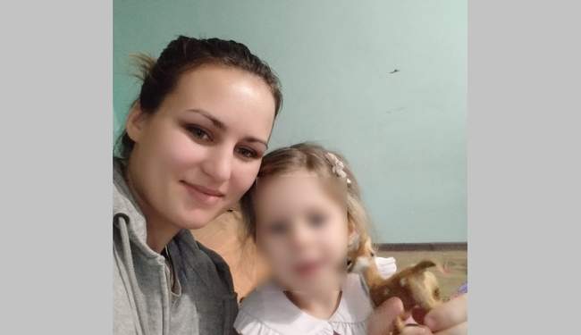 Saha Mangubi with her child. PHOTO: From the archive