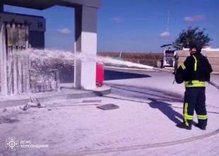 Kherson rescuers extinguish fire at gas station caused by explosives dumping