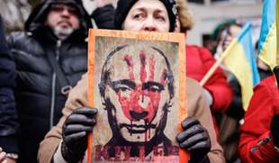 Чи можуть судити воєнних злочинців за їхньої відсутності